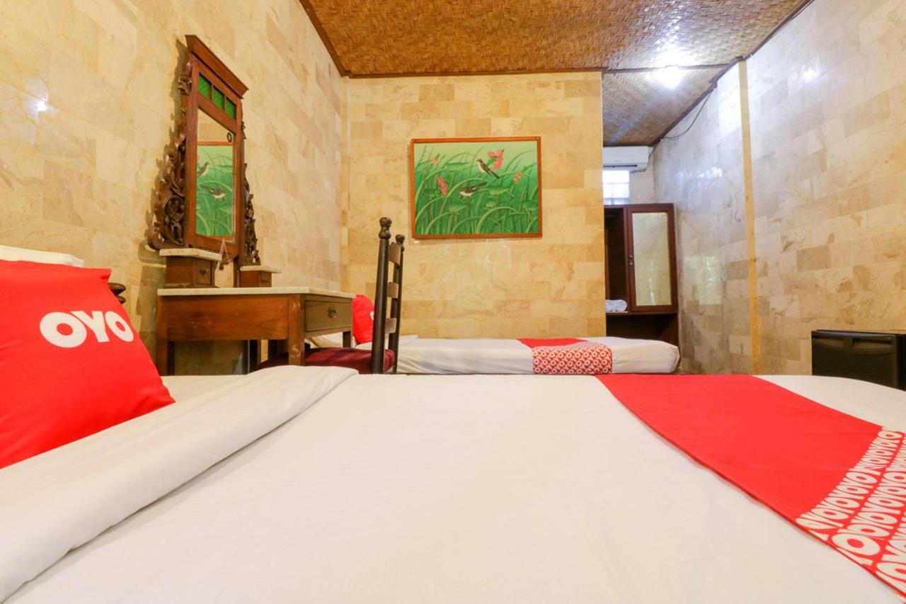 Oyo 1930 Ananda Beach Hotel Санур Экстерьер фото
