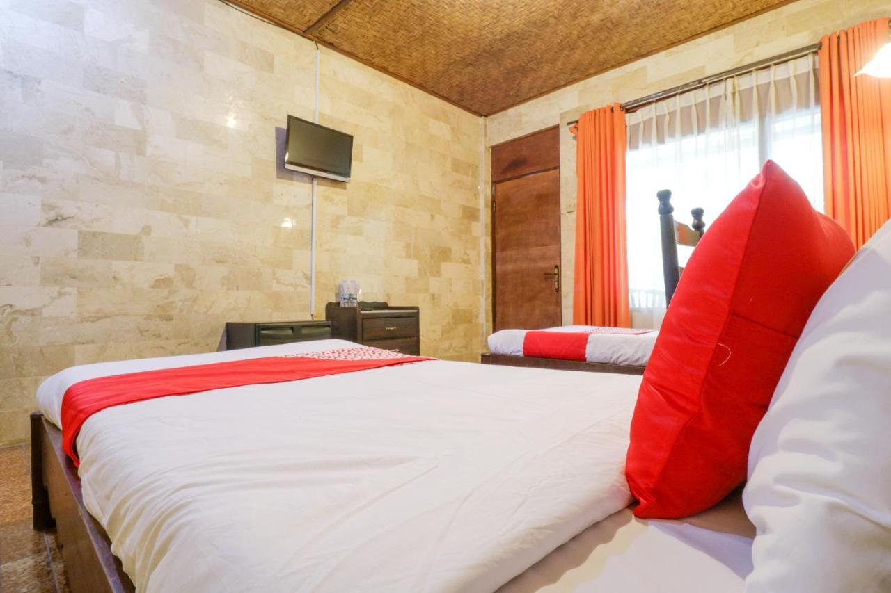 Oyo 1930 Ananda Beach Hotel Санур Экстерьер фото