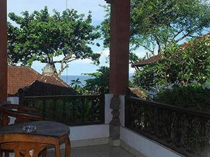 Oyo 1930 Ananda Beach Hotel Санур Экстерьер фото